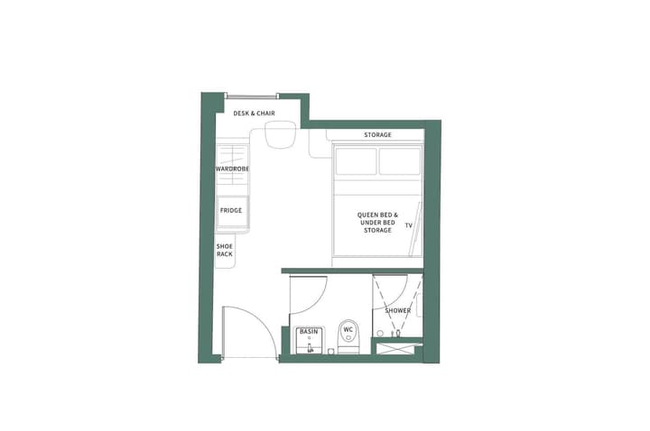 Architectural floor plan for the Midtown Premium Suite showing a layout with a queen bed, extensive storage, a full wardrobe, a desk, a fridge, and an en-suite bathroom with a shower.