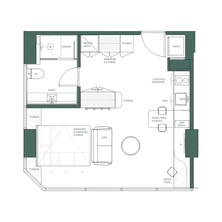 Floor plan of the Junior Luxe Suite at Weave Suites – Central West, showing a queen bed, a dedicated desk area, built-in storage, and a separate bathroom with shower.