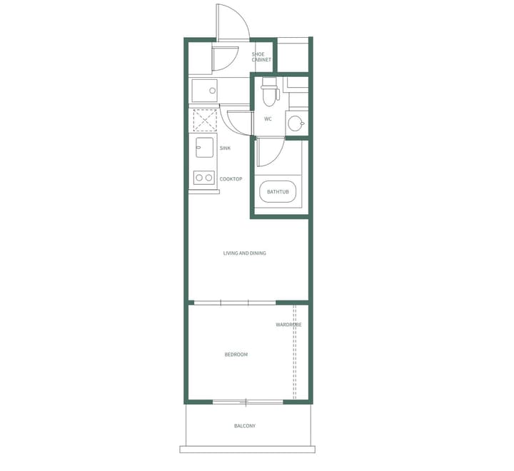 Narrow, vertically-oriented apartment floor plan for Unit B showing a kitchen, living and dining area, bedroom, and balcony, with labels written in English.