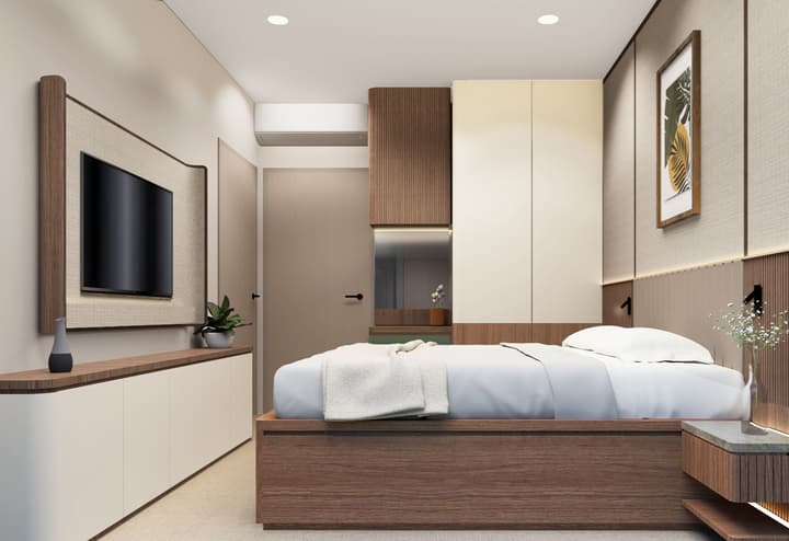 A sleek, modern apartment bedroom with a low wooden bed frame, custom cabinetry in wood and cream, a mounted TV, and neutral textured wallpaper.