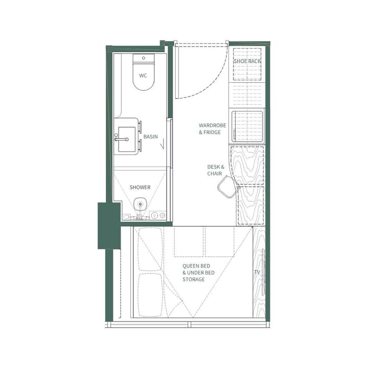Floor plan of the Premium Suite unit at Weave Suites – Central West, showing a queen bed, built-in desk/chair, wardrobe/fridge unit, and a long bathroom with shower.