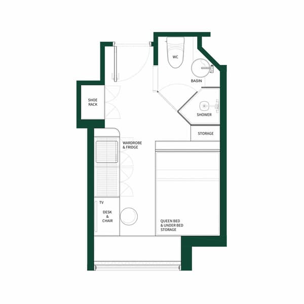 Black and white floor plan diagram for a small studio unit with a queen bed and under-bed storage. The efficient layout includes a desk and chair, a wardrobe and fridge area, a separate shower, basin, and WC bathroom, and a shoe rack near the entry.